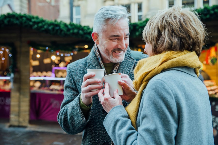Man and woman drinking coffee together