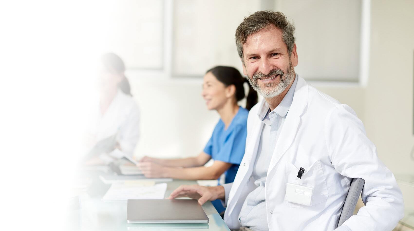 Doctors sitting around a table