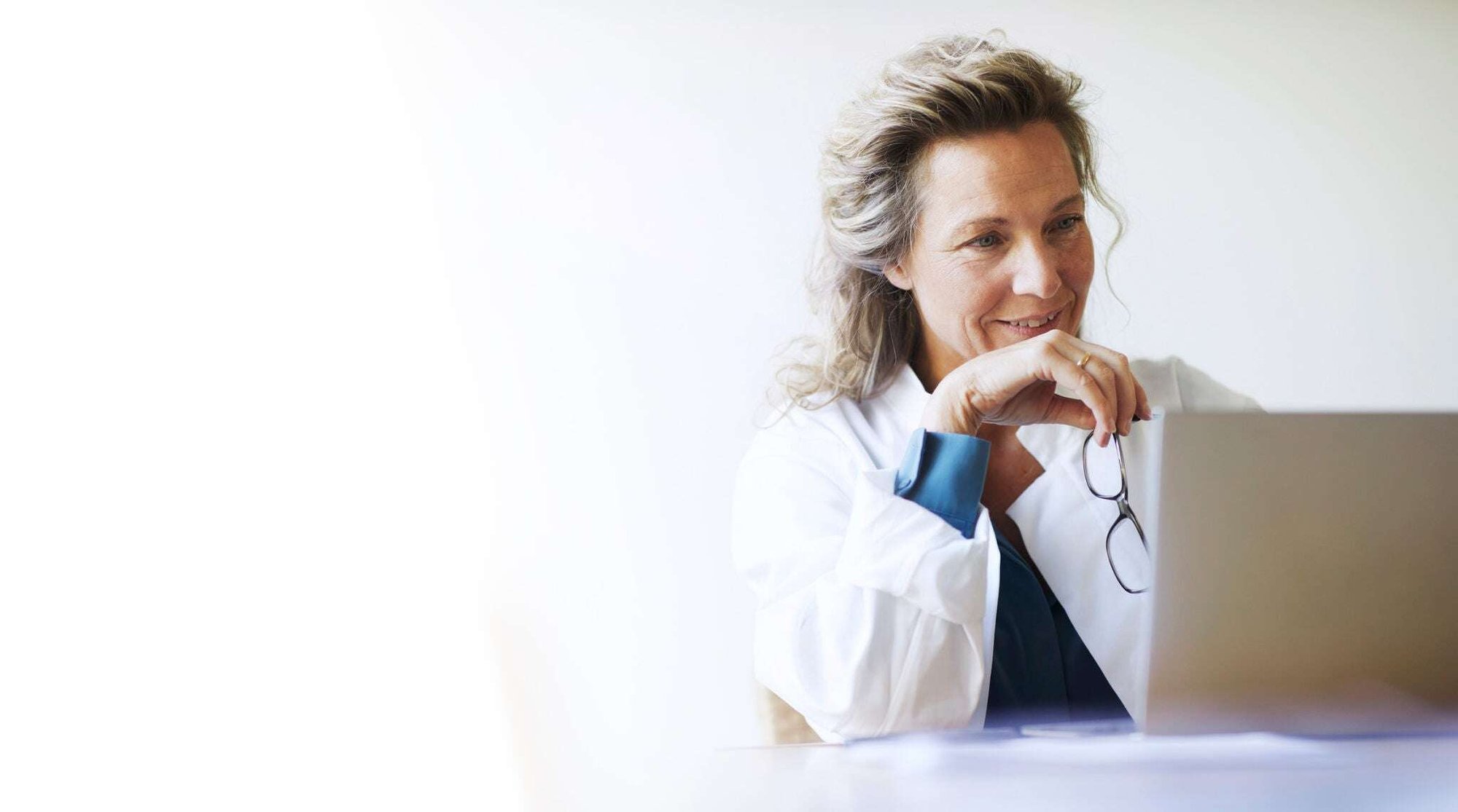 Doctor looking at a laptop screen