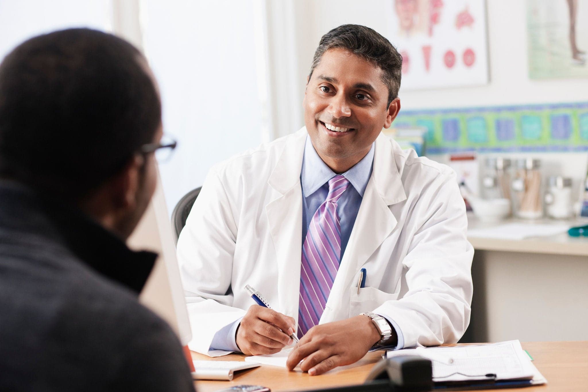 Physician talking to a patient
